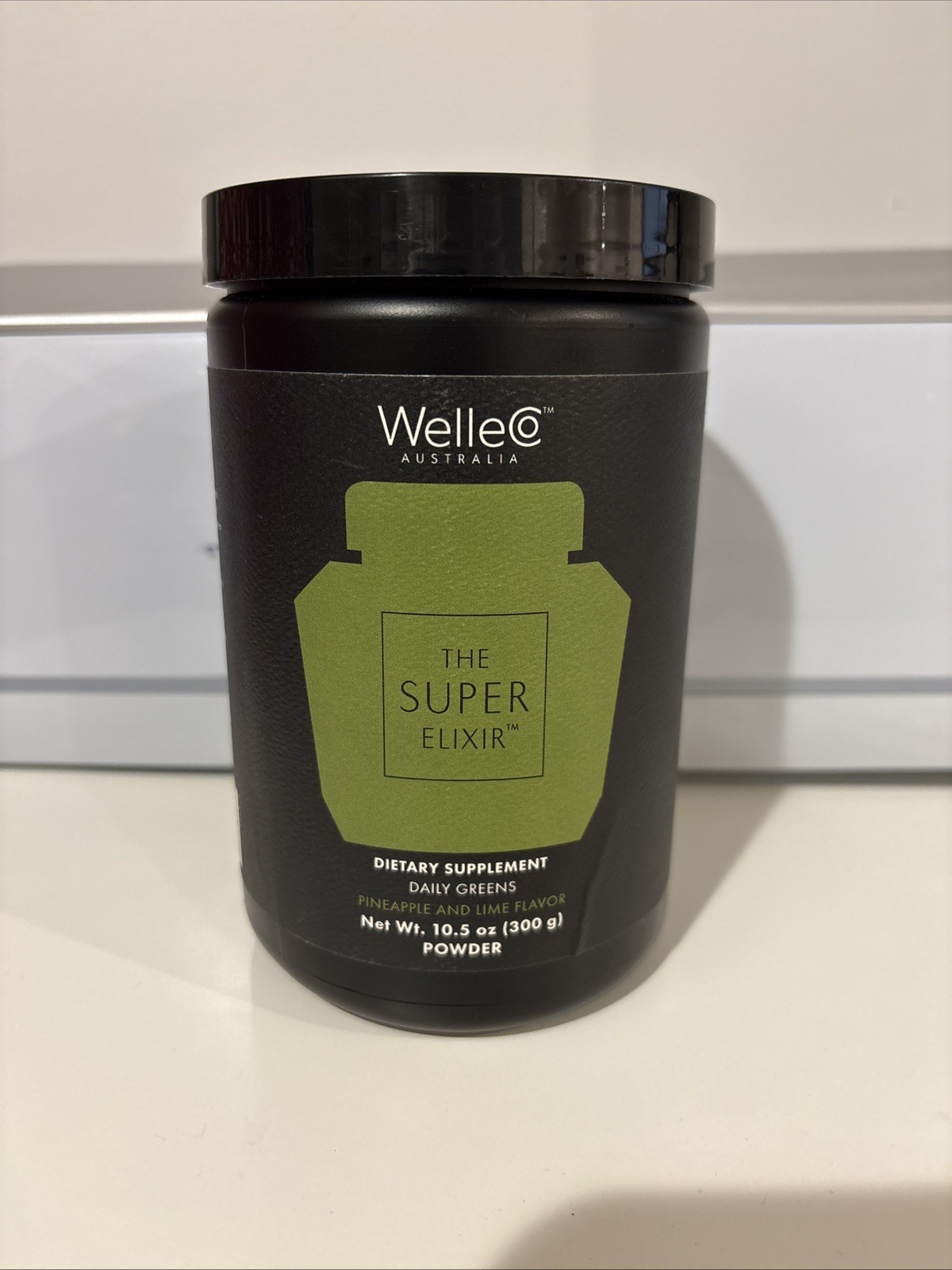 WelleCo The Super Elixir Daily Greens 10.5oz Powder Pineapple Lime NEW Exp 2/27