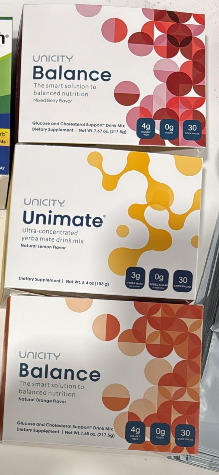 Unicity Unimate lemon Unicity Balance Mixed Berry and Balance Orange